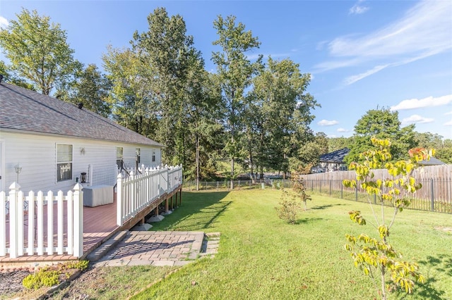 view of yard with a wooden deck