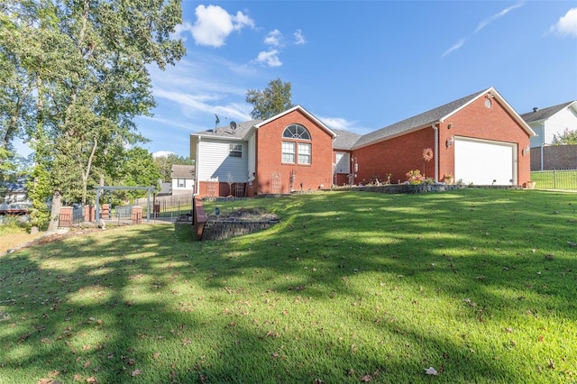 single story home featuring a garage and a front lawn