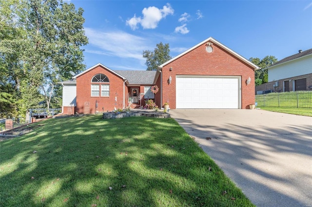 view of front of house with a front lawn and a garage