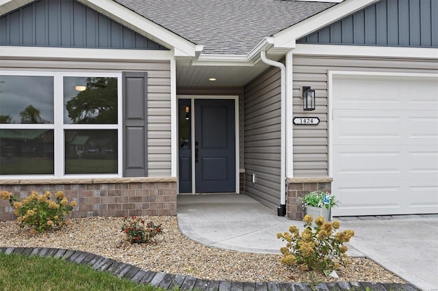 property entrance featuring a garage