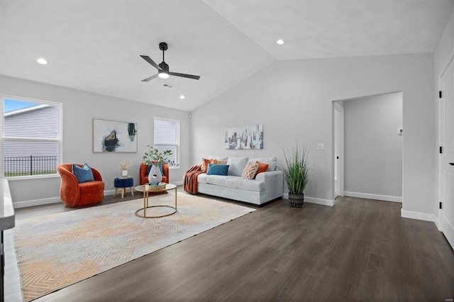 living room featuring ceiling fan, lofted ceiling, and dark hardwood / wood-style floors