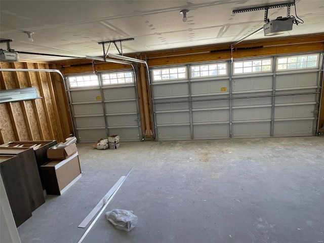 garage featuring a garage door opener