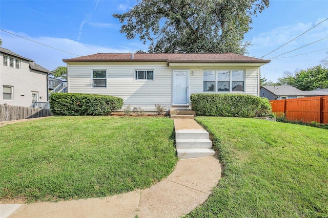 view of front facade with a front lawn