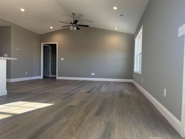 unfurnished living room featuring ceiling fan, lofted ceiling, and dark wood-type flooring