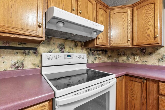 kitchen with white electric range oven