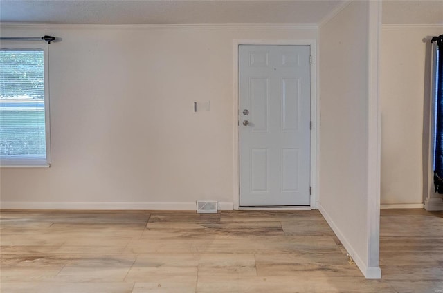 entrance foyer with crown molding