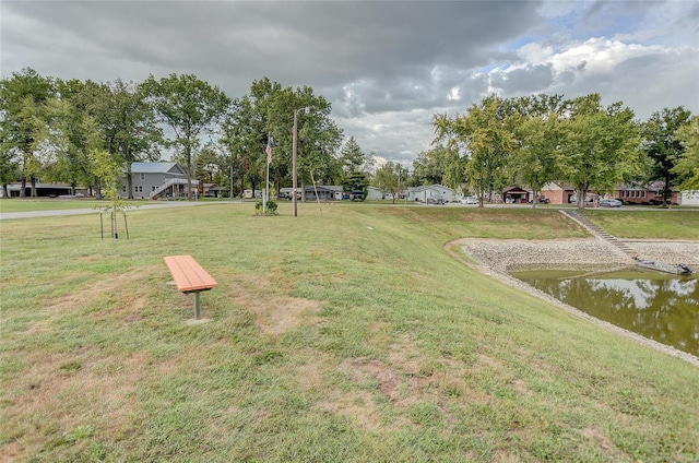 view of yard with a water view