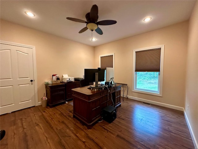 office area featuring dark hardwood / wood-style floors and ceiling fan