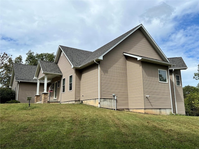 view of property exterior featuring a yard