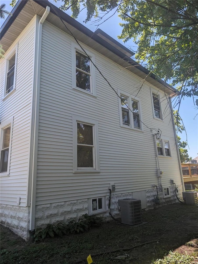 view of property exterior featuring central AC