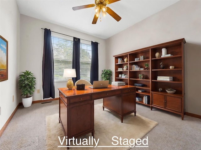 home office with ceiling fan and light colored carpet