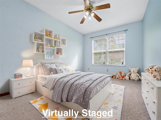 bedroom featuring ceiling fan and light carpet