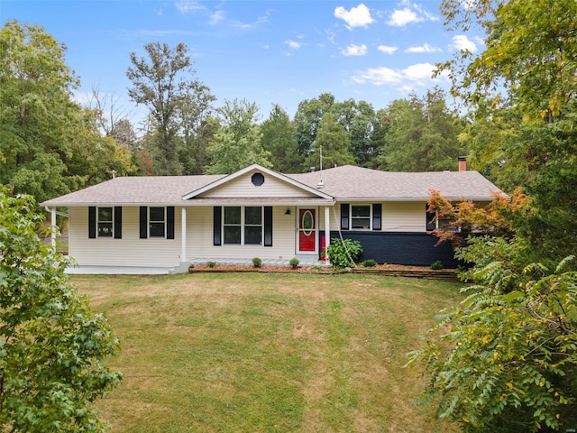 ranch-style house with a porch and a front lawn