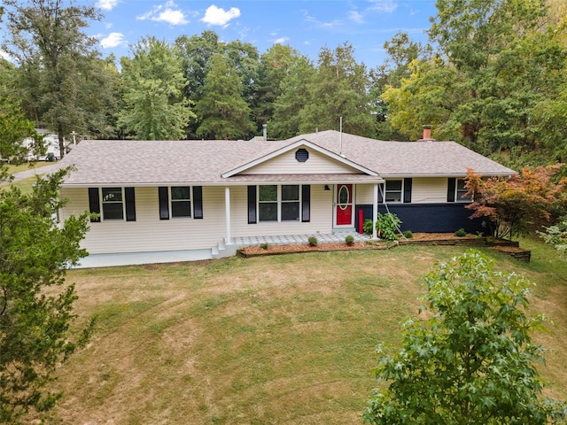 ranch-style house featuring a front yard and a porch