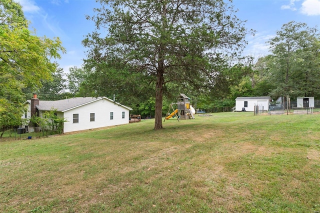 view of yard with a playground