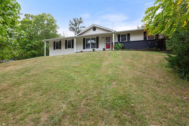 single story home featuring a front yard