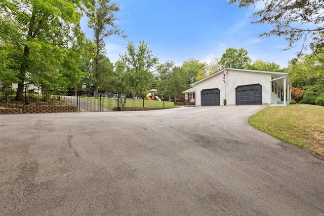 exterior space featuring a carport and a front lawn