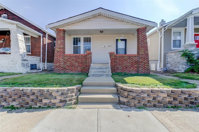 bungalow-style home featuring a porch