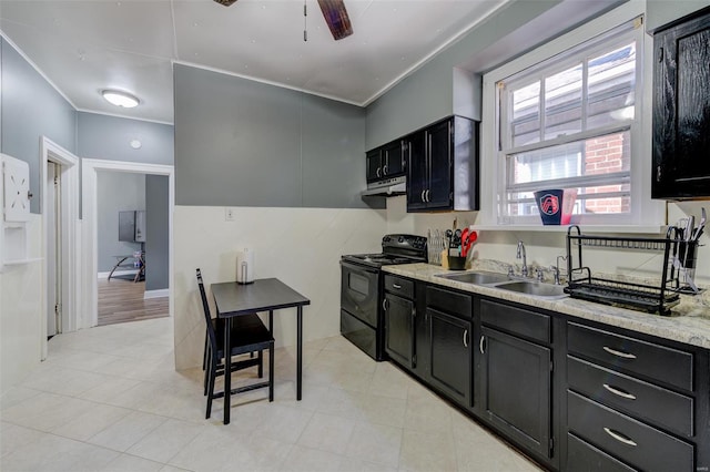 kitchen with black electric range, sink, crown molding, light stone countertops, and ceiling fan