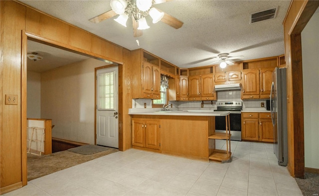 kitchen featuring appliances with stainless steel finishes, backsplash, kitchen peninsula, ventilation hood, and ceiling fan