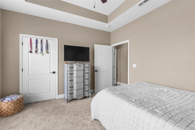 carpeted bedroom with ceiling fan