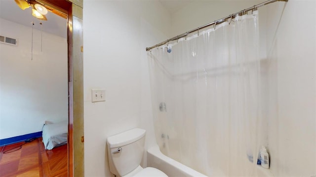 bathroom with ceiling fan, parquet flooring, toilet, and shower / bathtub combination with curtain