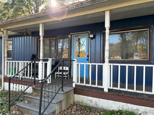 entrance to property with a porch