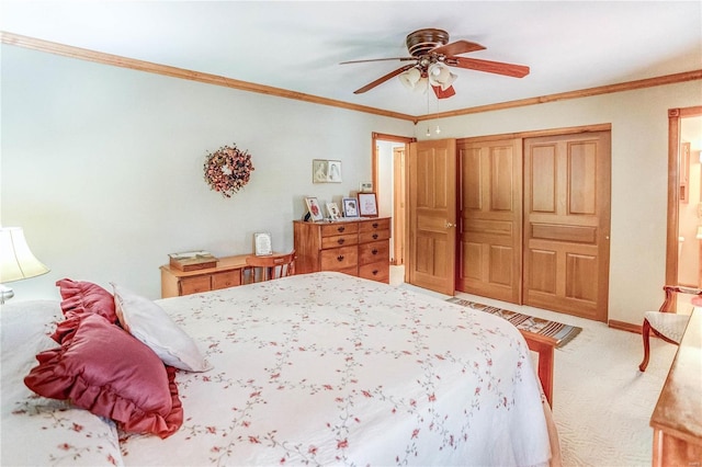 bedroom featuring ceiling fan, light colored carpet, and ornamental molding