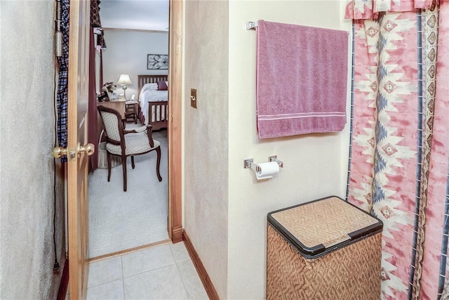 bathroom with tile patterned flooring