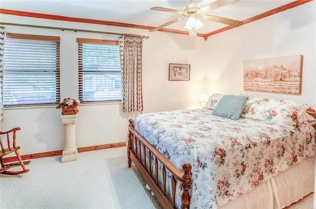 bedroom featuring ceiling fan, crown molding, and carpet