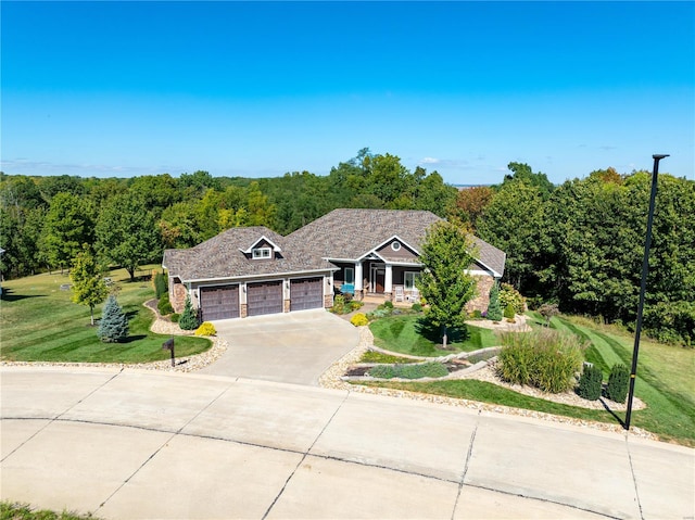 ranch-style house with a front lawn and a garage