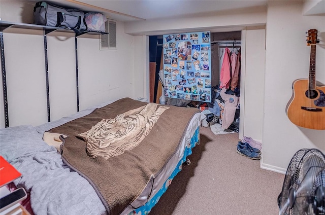 bedroom with a closet and carpet floors