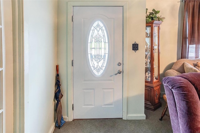 entrance foyer with carpet