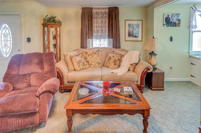 carpeted living room featuring a healthy amount of sunlight