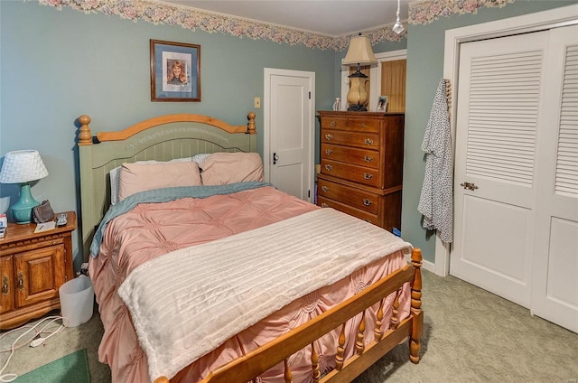 carpeted bedroom with a closet