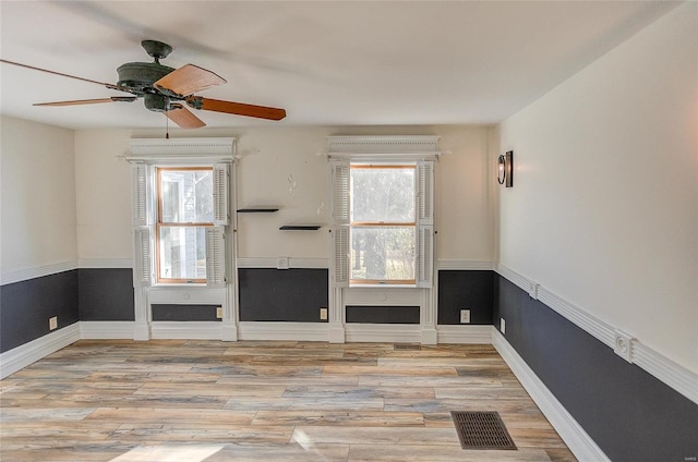 unfurnished living room with light hardwood / wood-style floors and ceiling fan