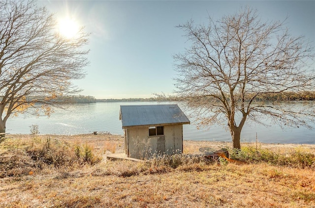 view of outdoor structure with a water view