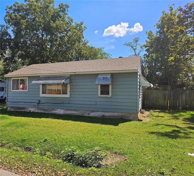 view of home's exterior featuring a lawn