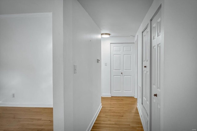 hallway featuring light wood-type flooring