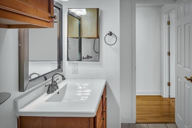 bathroom with vanity and tile patterned floors