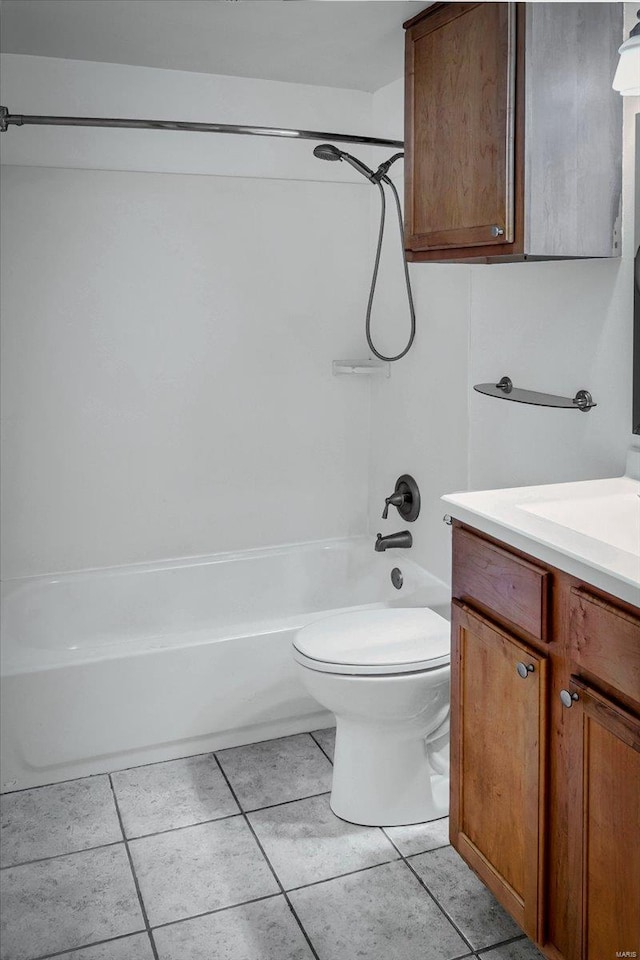 full bathroom with shower / bath combination, vanity, tile patterned floors, and toilet