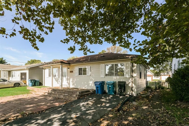 rear view of property featuring a patio