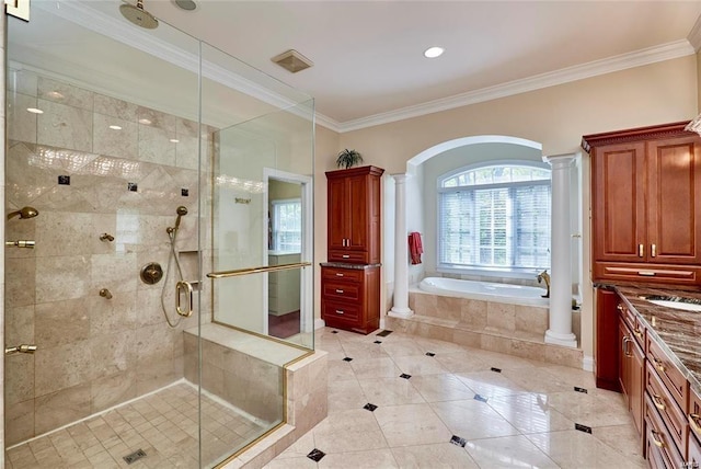 bathroom with independent shower and bath, vanity, ornamental molding, and ornate columns