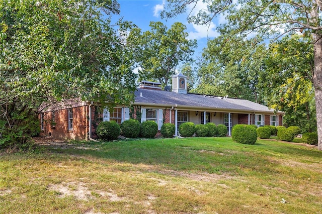 view of front of home with a front lawn