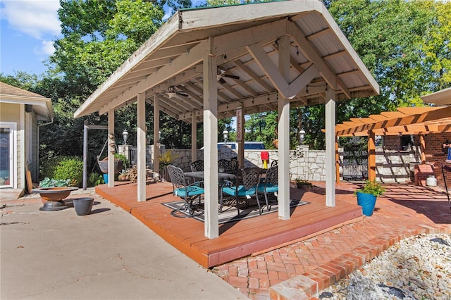 view of patio featuring a deck and a gazebo