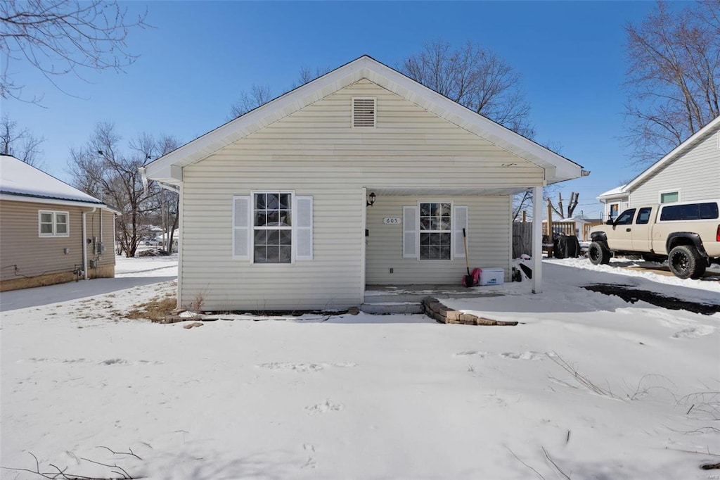 view of snow covered property