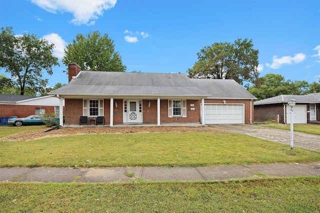 ranch-style house featuring a garage, a front lawn, and a porch