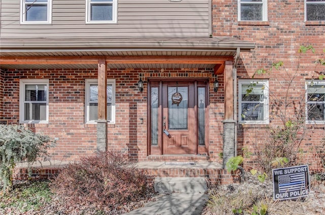 entrance to property with covered porch