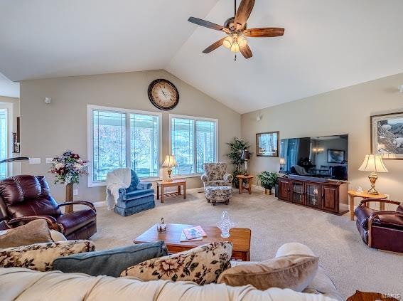 living room with carpet floors, vaulted ceiling, and ceiling fan