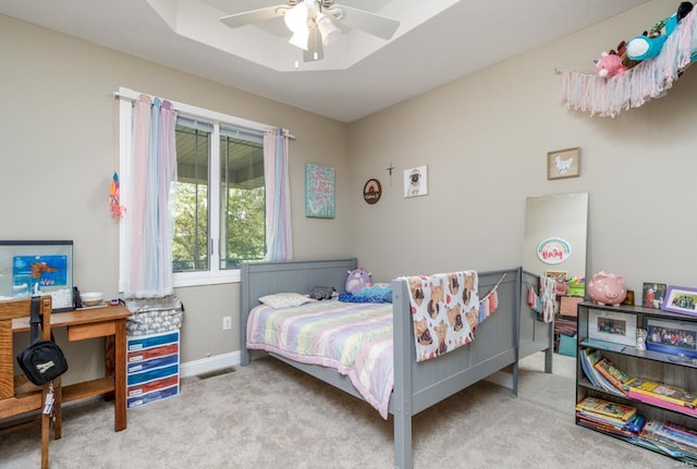 bedroom featuring ceiling fan and light colored carpet